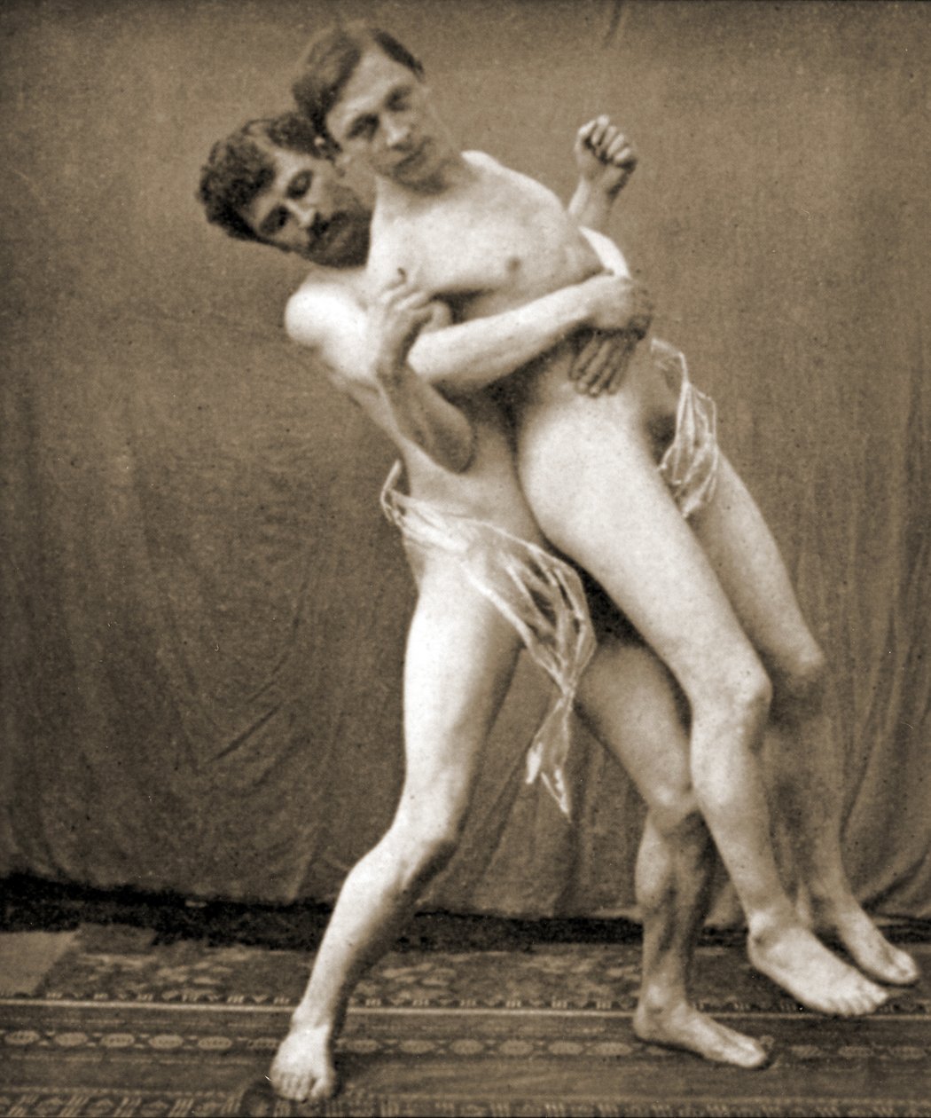 Worstelaars demonstreren de taillegreep, ca. 1910 door Unknown