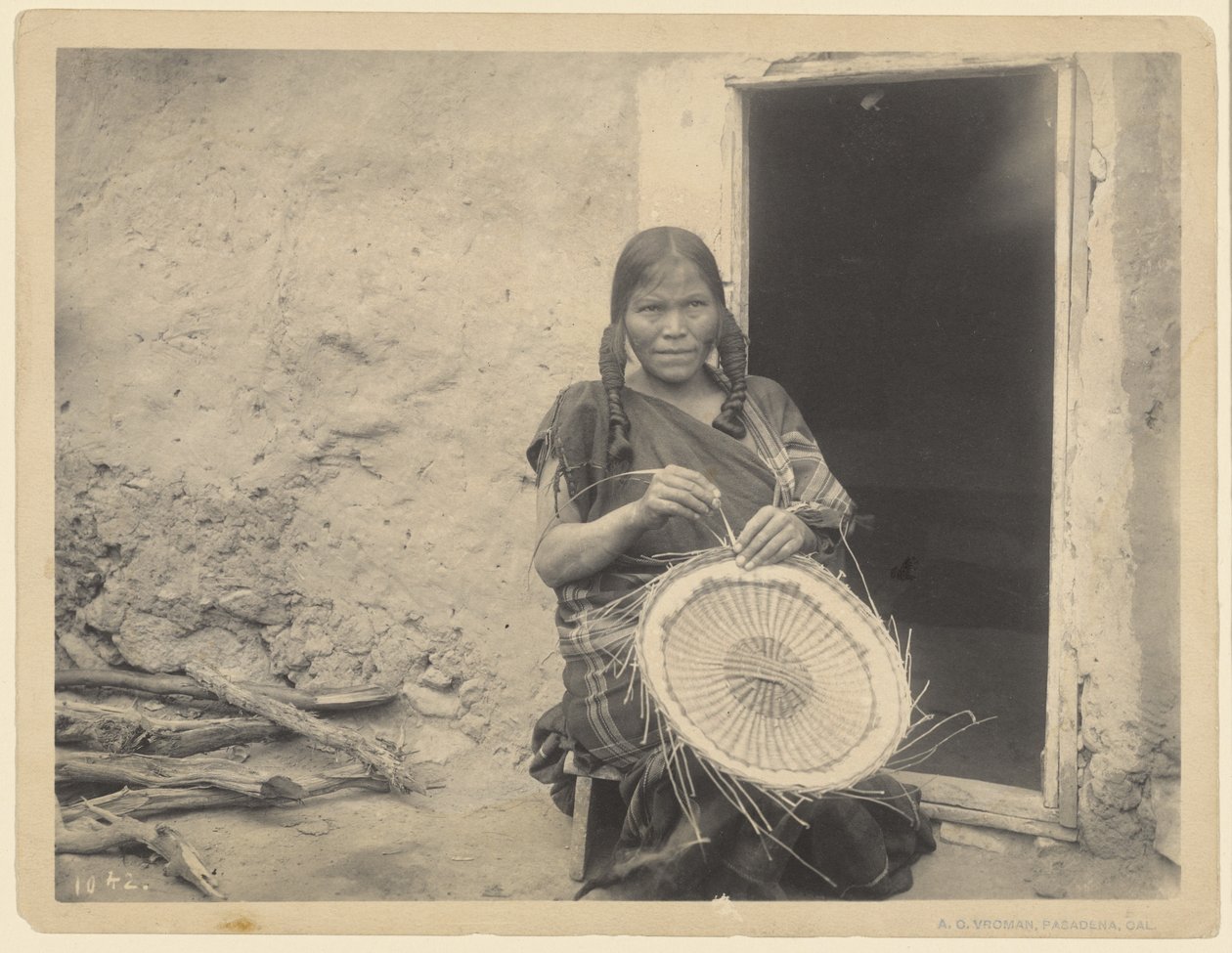 Hopi-steden, mandenmaker door Adam Clark “A. C.” Vroman