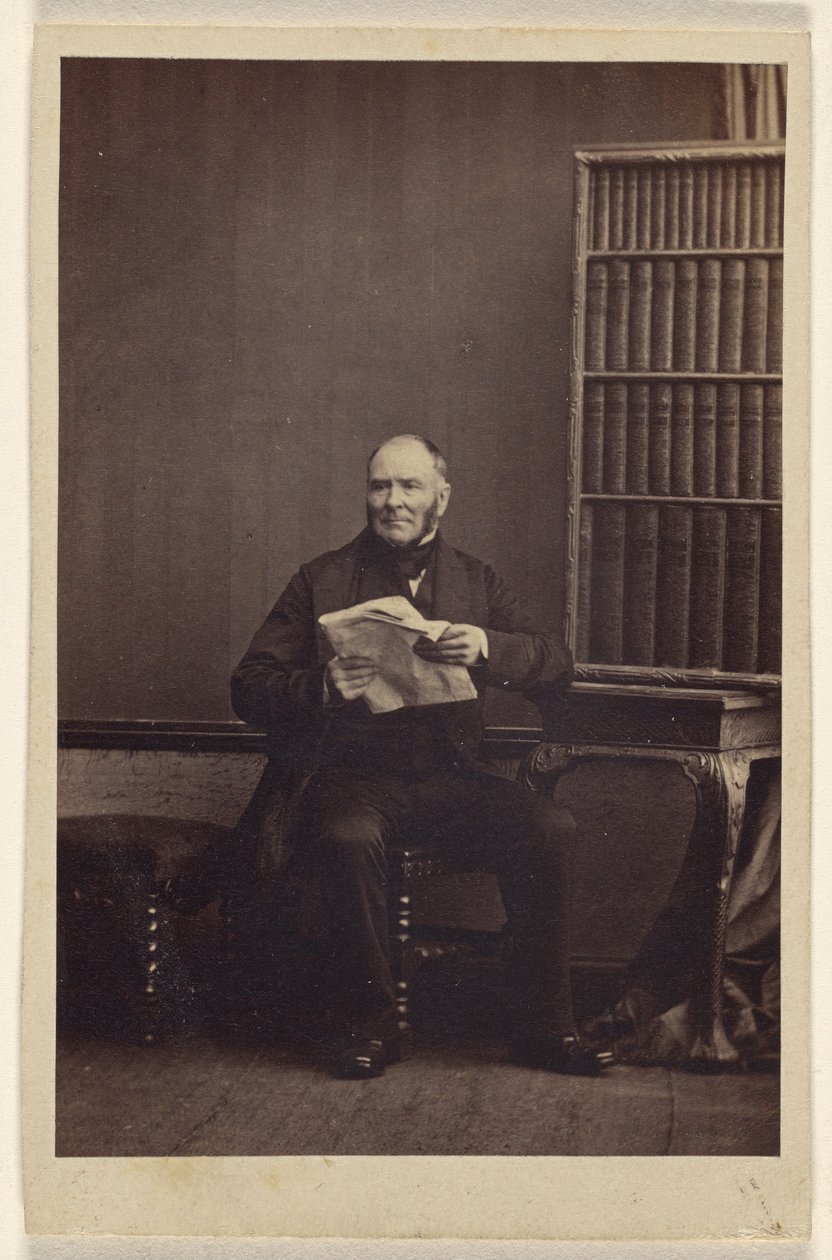 [Ongeïdentificeerde man zittend, met een krant in de hand]. door Camille Silvy
