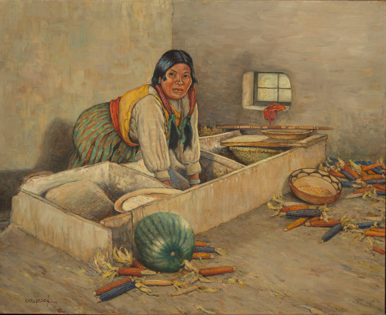 Hopi vrouw maalt maïs door Carl Moon