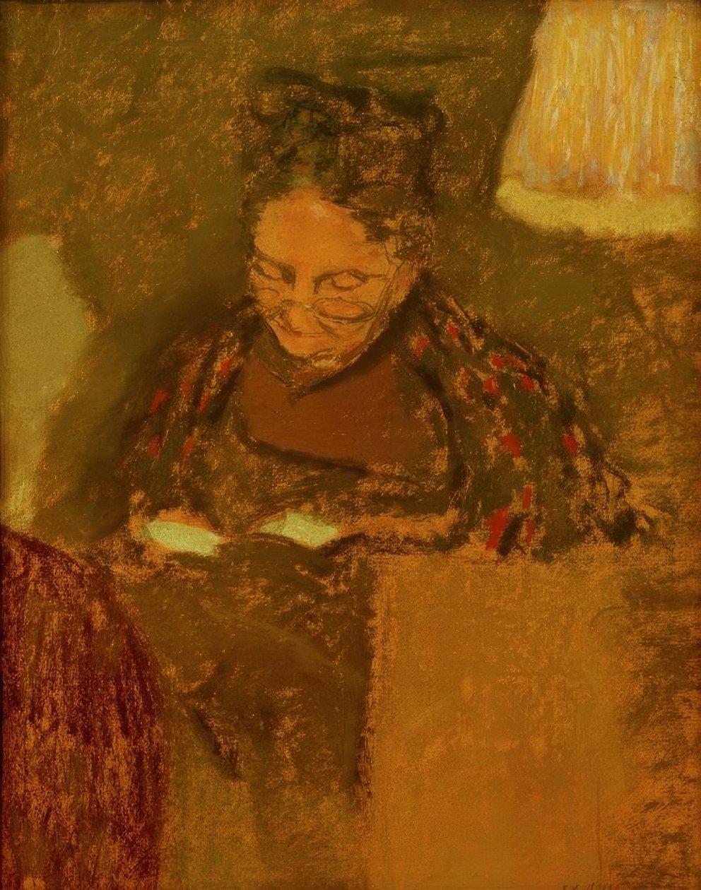 Madame Vuillard lezend bij het licht van een lamp door Edouard Vuillard