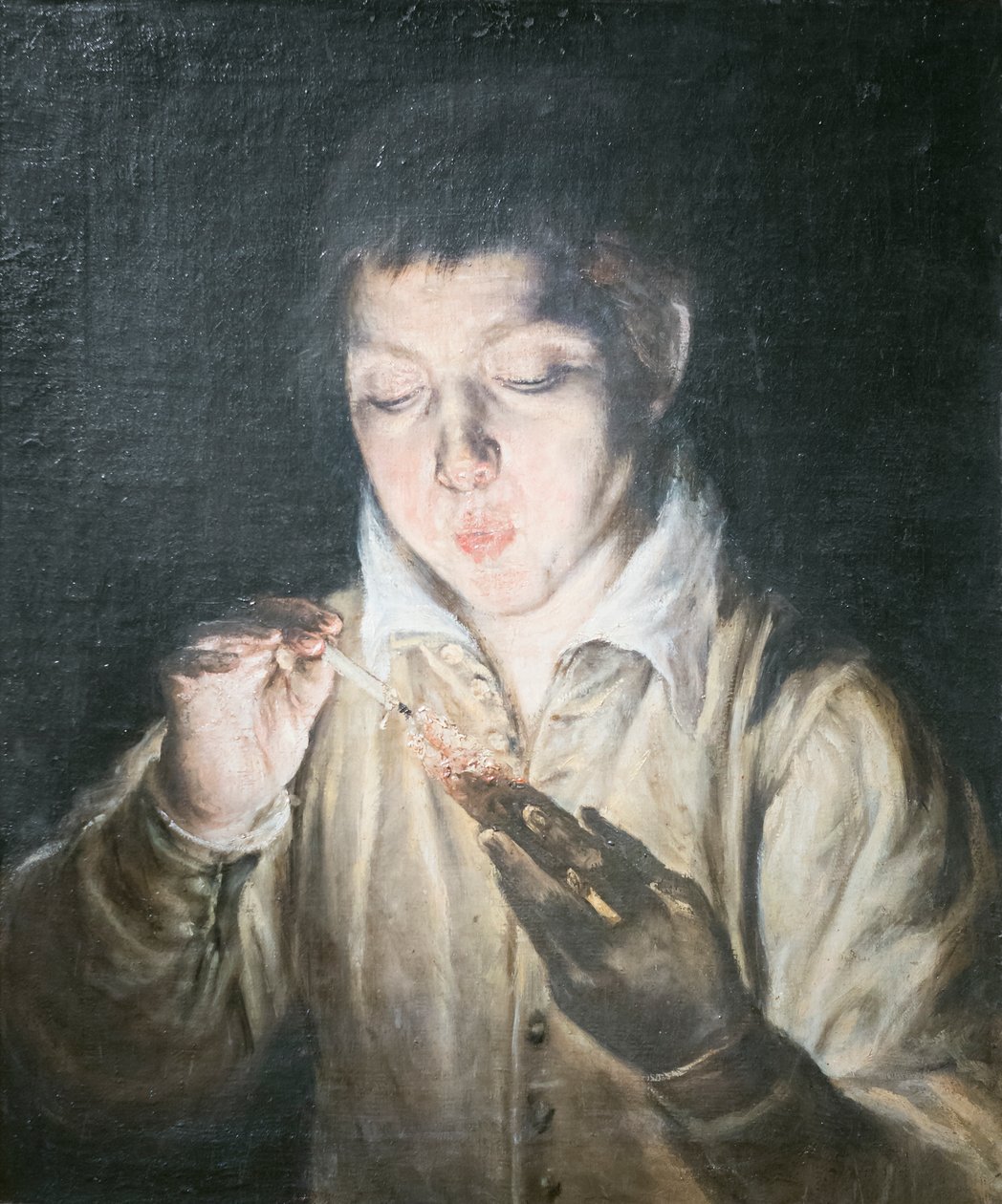 Jongen die een kooltje blaast door El (1541 1614) Greco