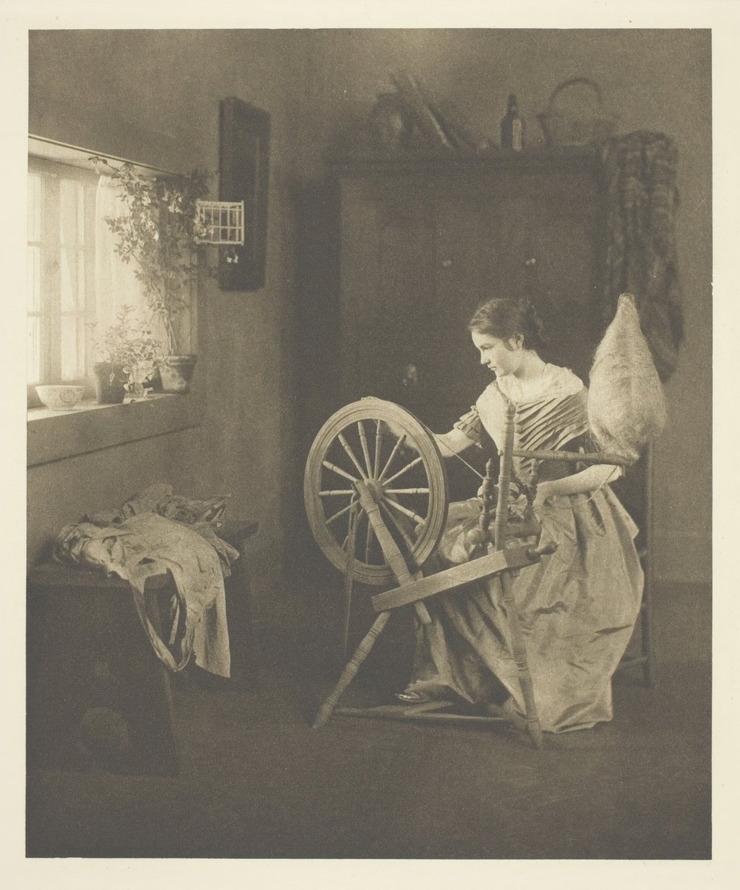 Spinnen, ca. 1898 door Emilie V. Clarkson