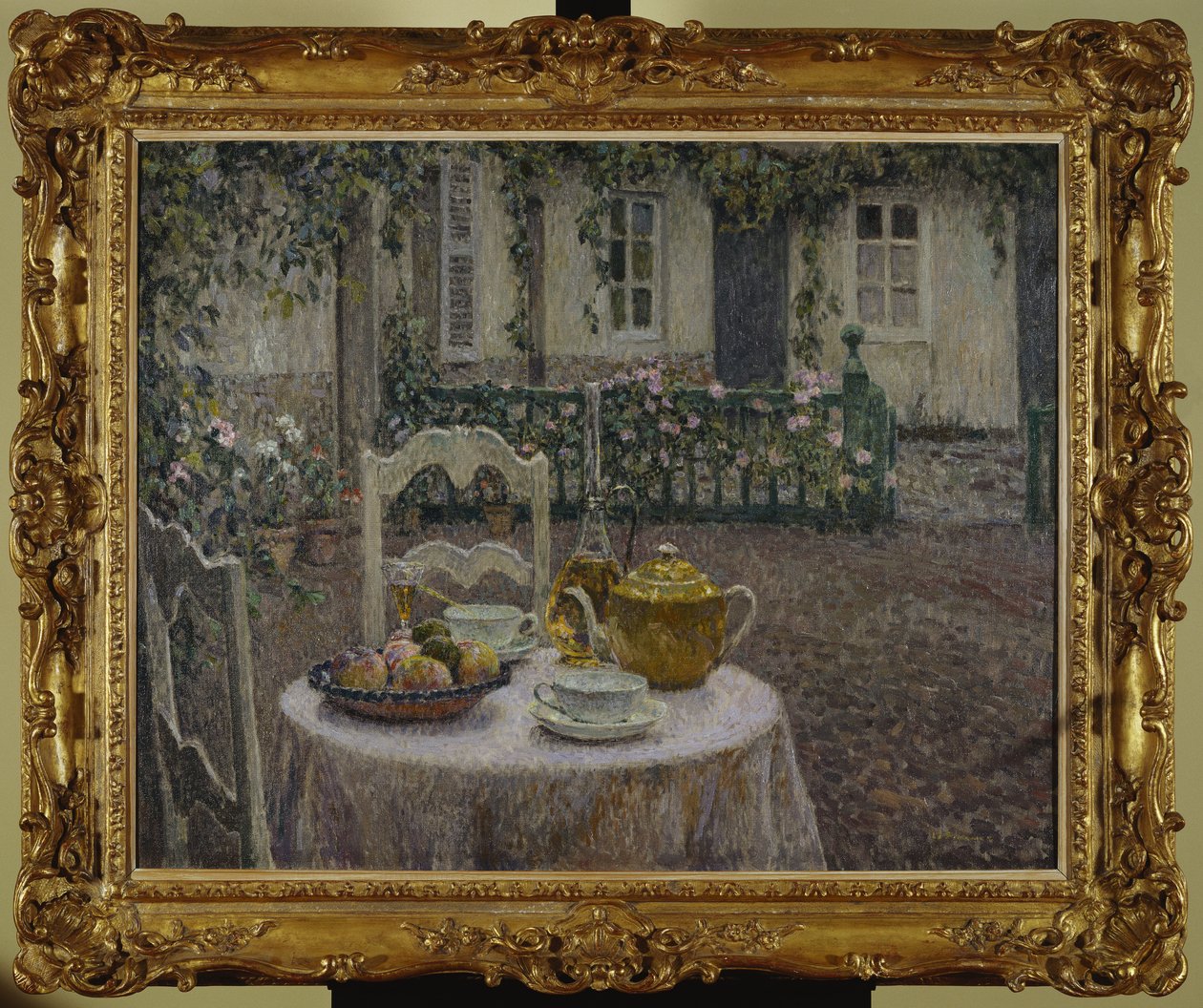 Het roze tafelkleed door Henri Eugene Augustin Le Sidaner
