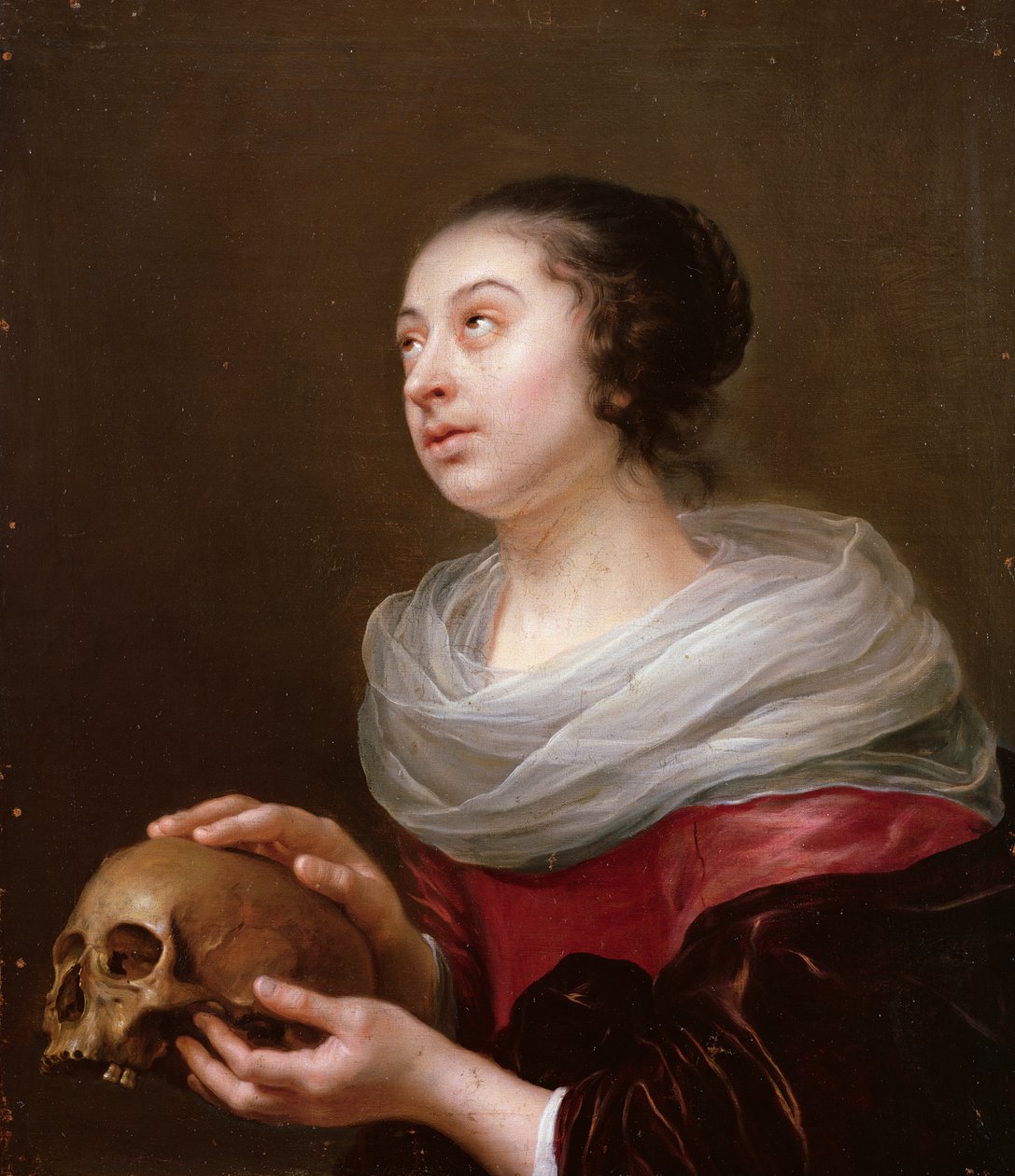 Een jonge vrouw die een schedel vasthoudt, 1640s door Jan Olis