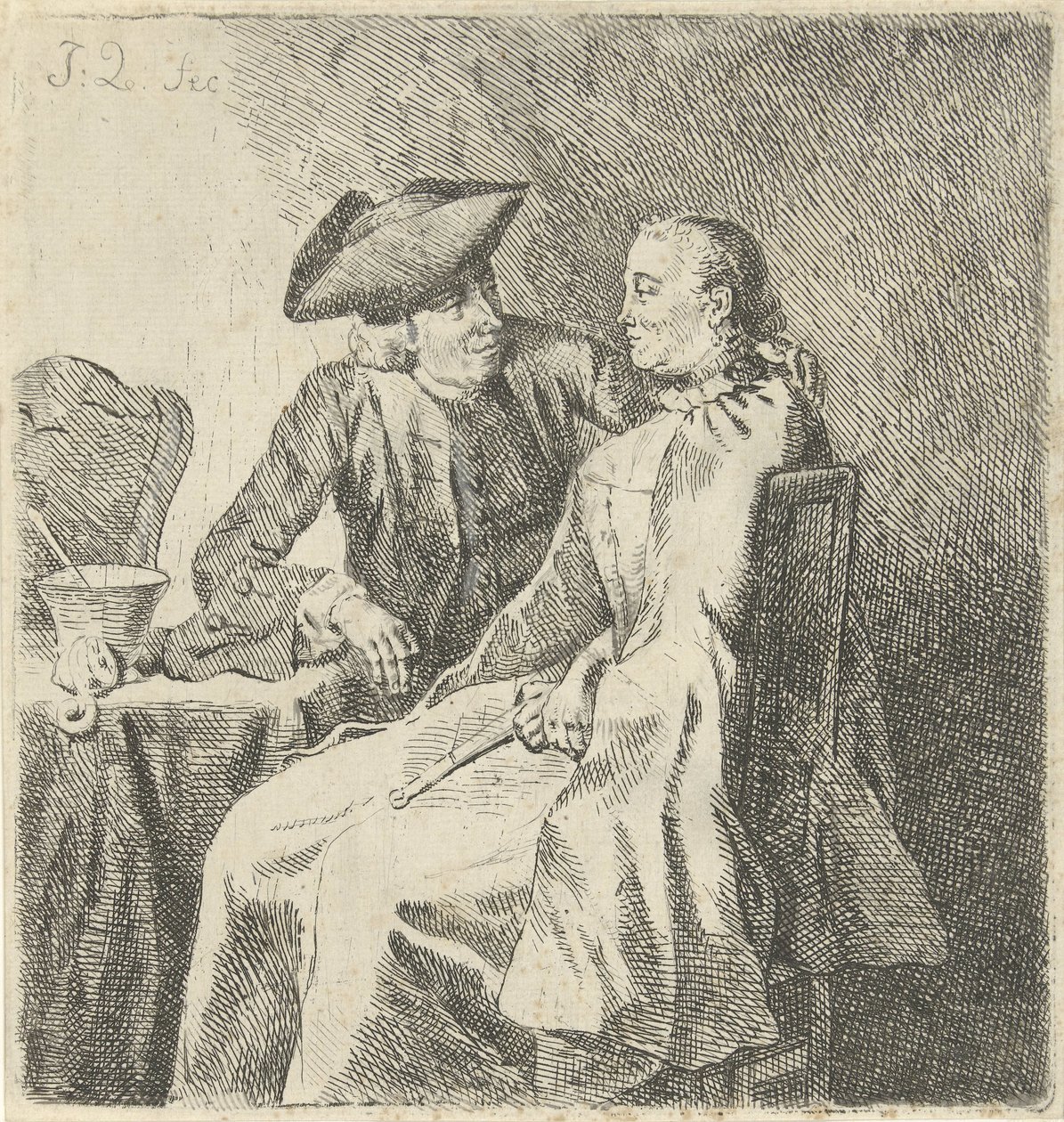 Man en vrouw aan een tafel door Julius Henricus Quinkhard