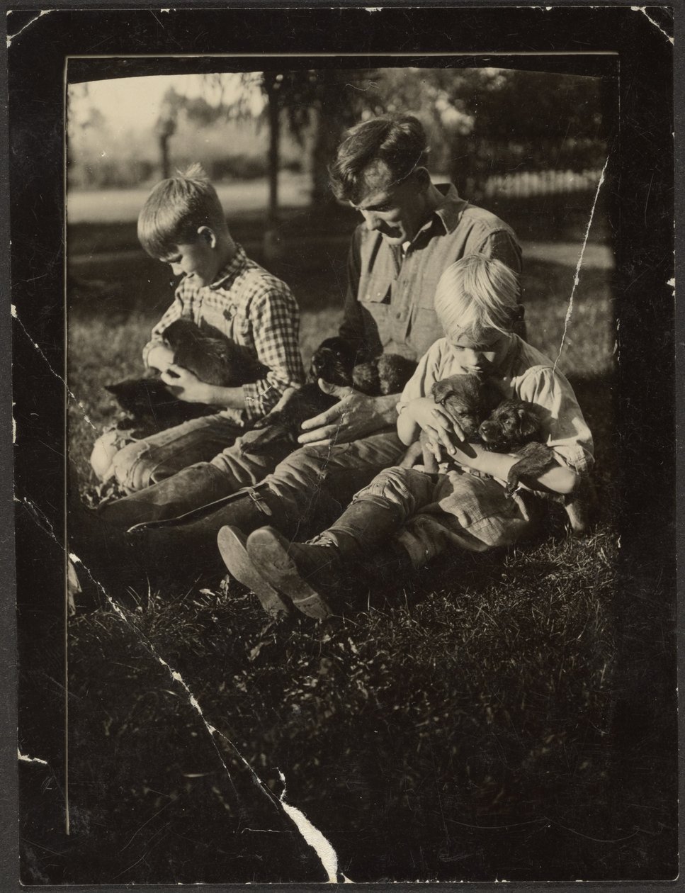 [Man met kinderen en puppy