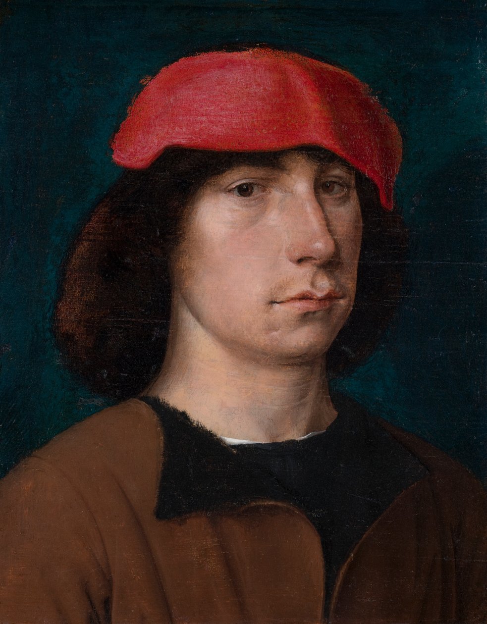 Een jonge man met een rode pet, ca. 1512 door Michiel Sittow