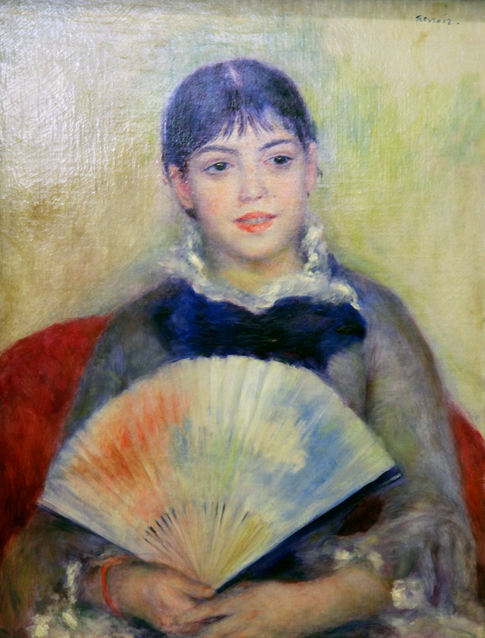 Jonge vrouw met een waaier door Pierre Auguste Renoir