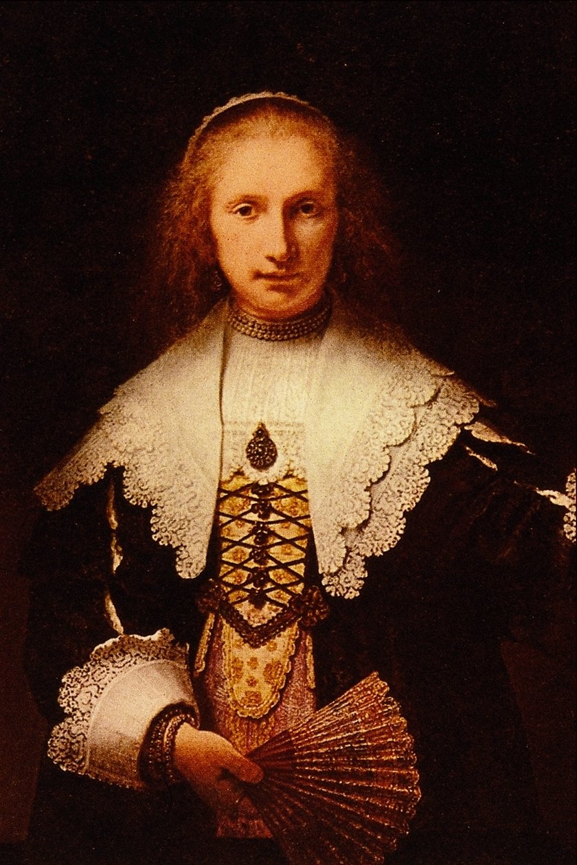 Dame met een waaier door Rembrandt van Rijn