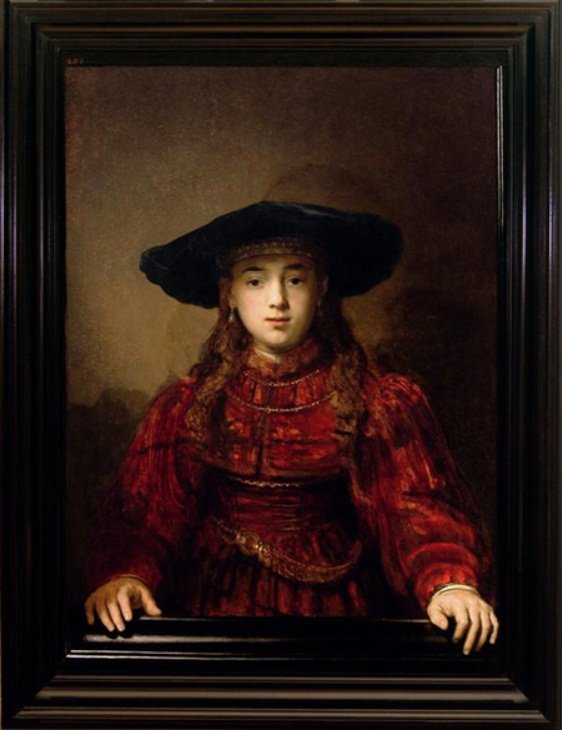 Meisje in een schilderijlijst door Rembrandt van Rijn