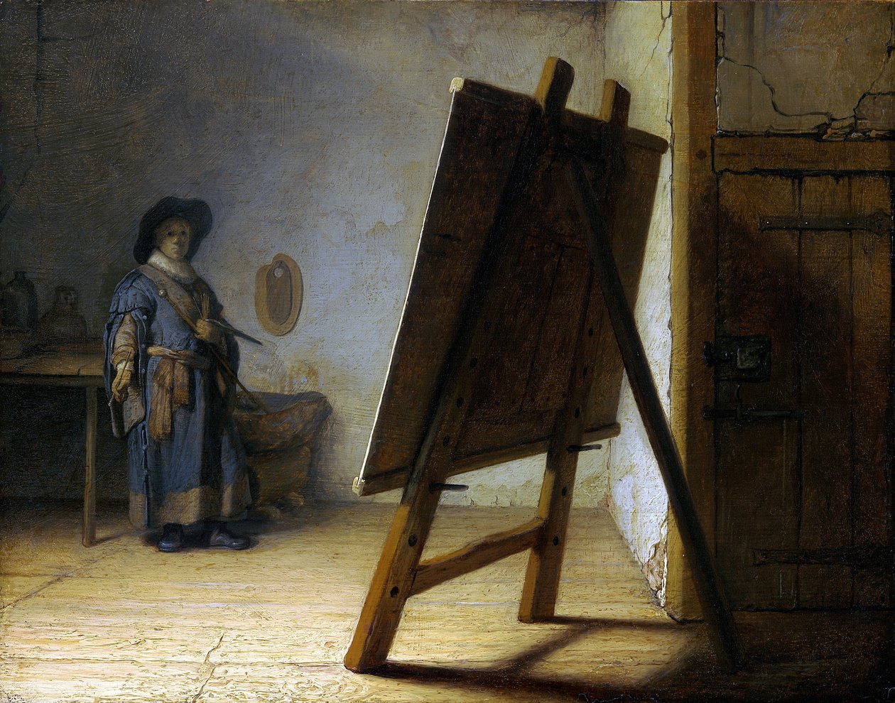 De kunstenaar in zijn atelier door Rembrandt van Rijn