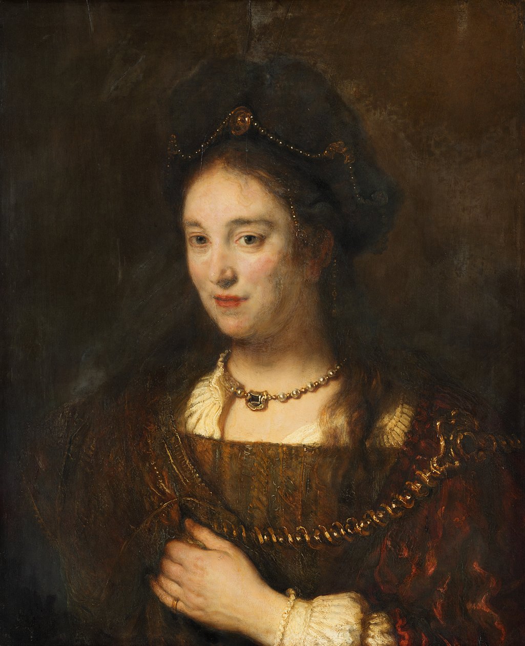 Halffigur van een vrouw met baret door Rembrandt