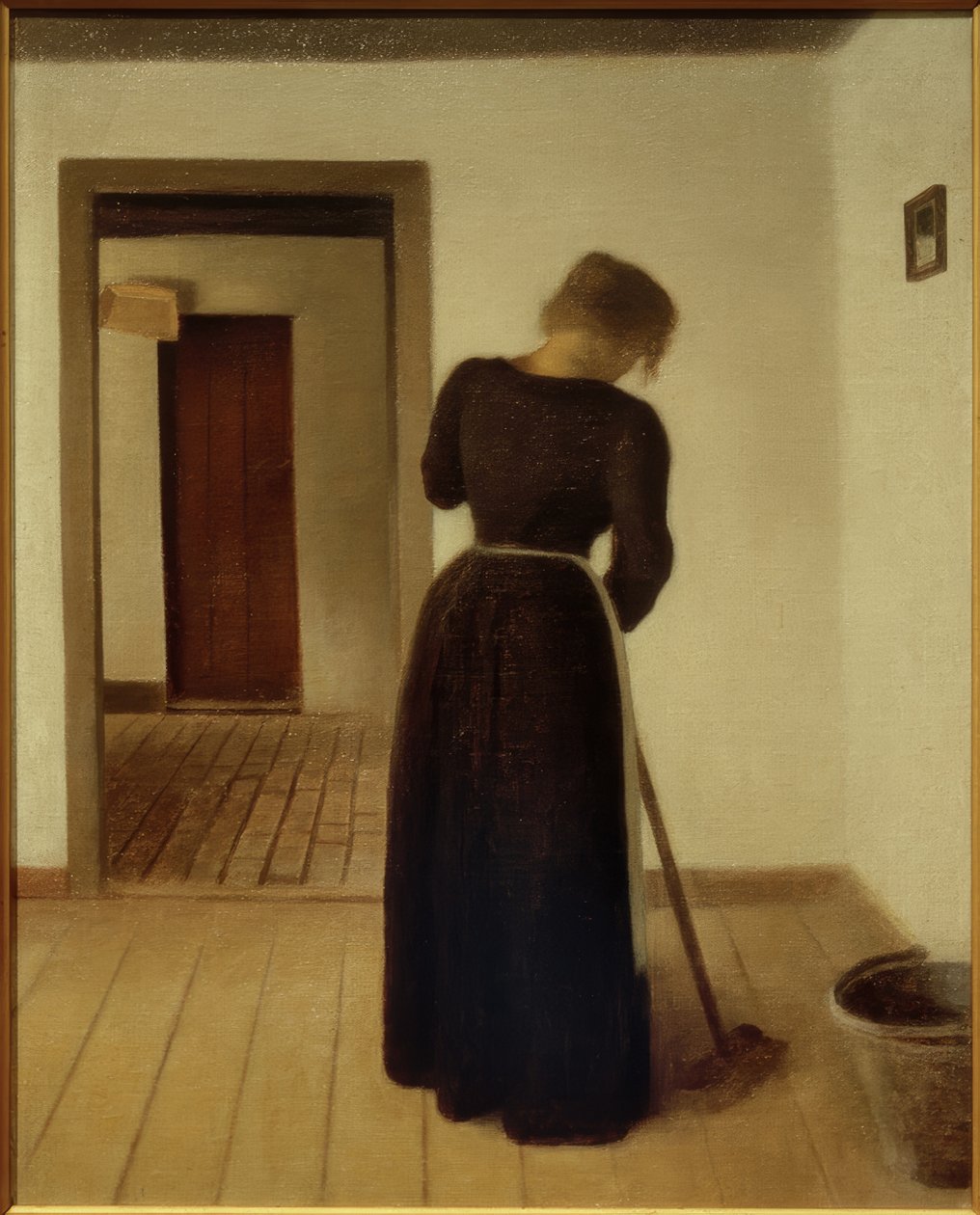 Interieur met een jonge vrouw aan het vegen door Vilhelm Hammershoi