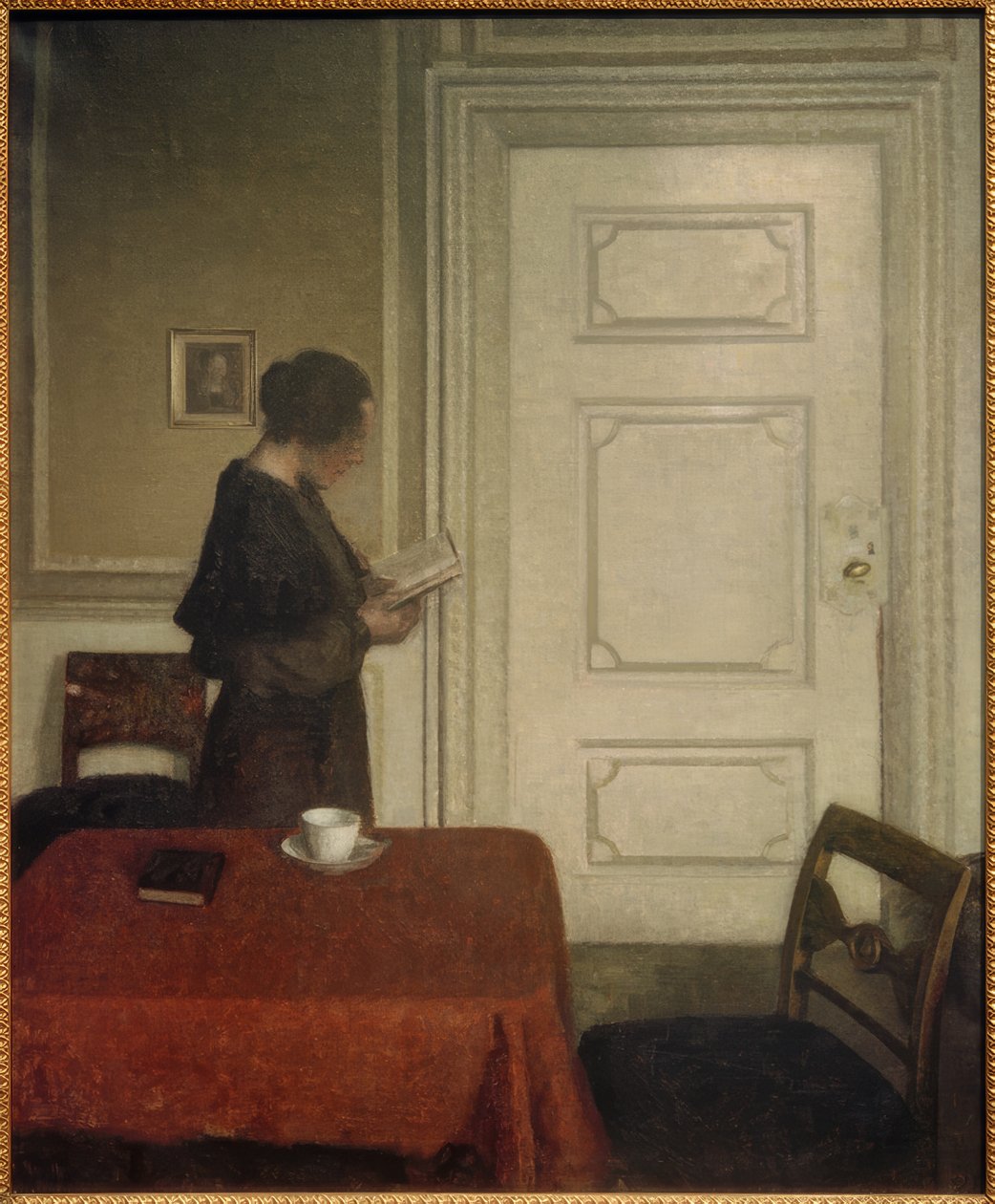 Lezende vrouw door Vilhelm Hammershoi