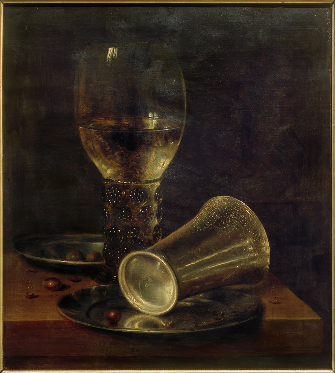 Stilleven met omgevallen drinkbeker door Willem Claesz. Heda