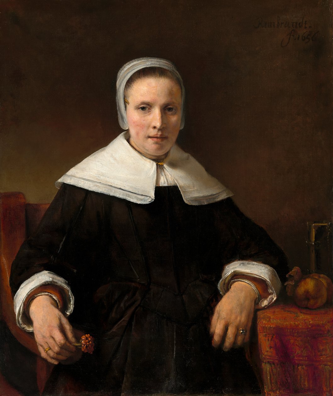 Een Vrouw die een Anjer Vasthoudt door Workshop of Rembrandt