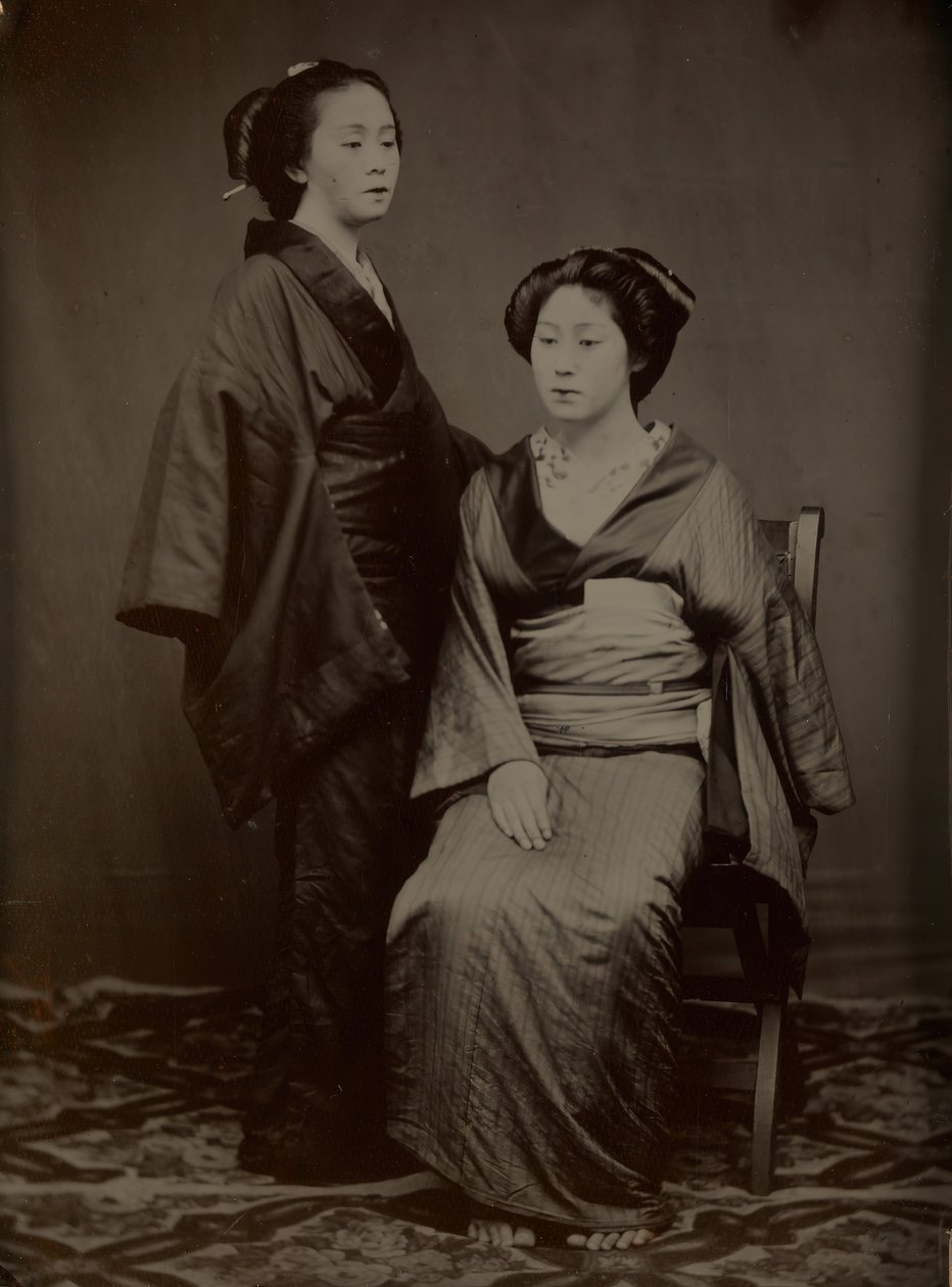 Geisha met bediende, 1860s door Yokoyama Matsusaburo