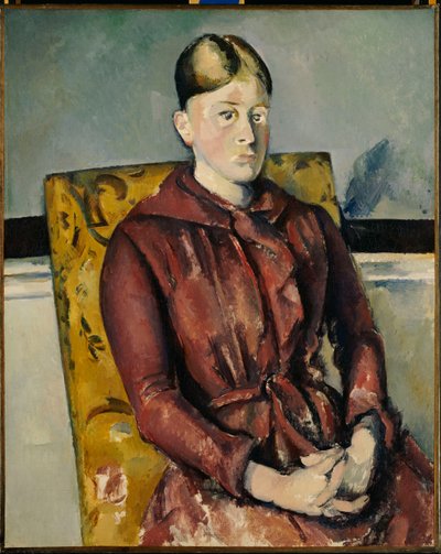 Madame Cezanne met een gele fauteuil door Paul Cézanne