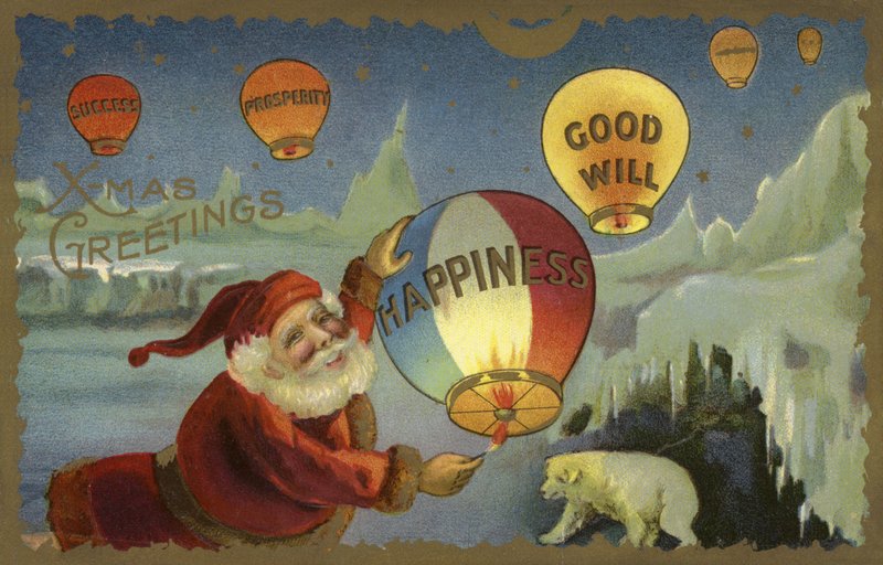Kerstman die ballonnen oplaat door English School
