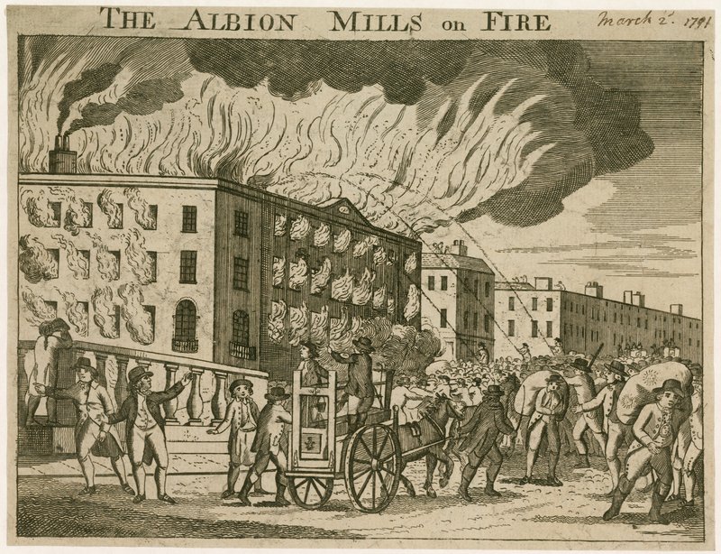 De Albion Mills in brand door English School