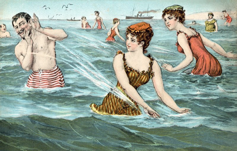 Meisjes spetteren een man in de zee nat door French School